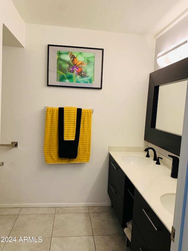 bathroom with vanity and tile patterned floors