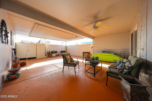 view of patio / terrace with ceiling fan, an outdoor hangout area, and a fenced backyard