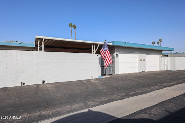 garage with fence