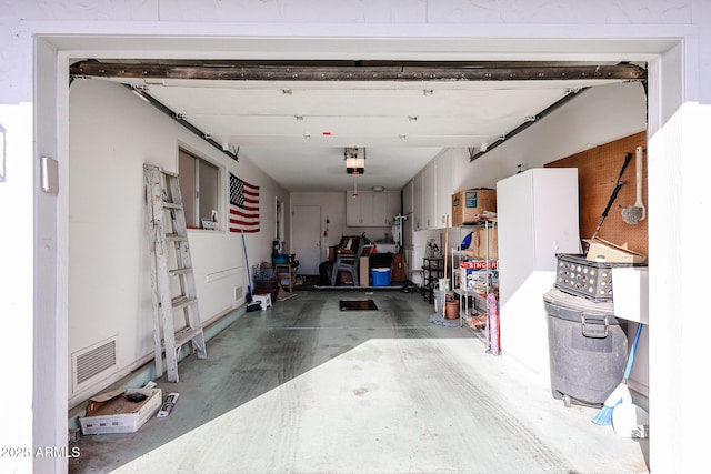 garage featuring visible vents