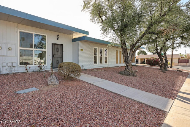 view of front of property with brick siding