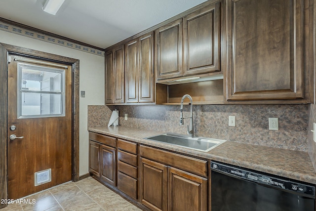 2432 W Echo Ln, Phoenix, AZ 85021 - kitchen featuring black dishwasher and backsplash