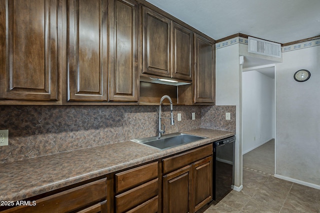 2432 W Echo Ln, Phoenix, AZ 85021 - kitchen with black dishwasher, decorative backsplash, dark brown cabinets, and light tile patterned flooring