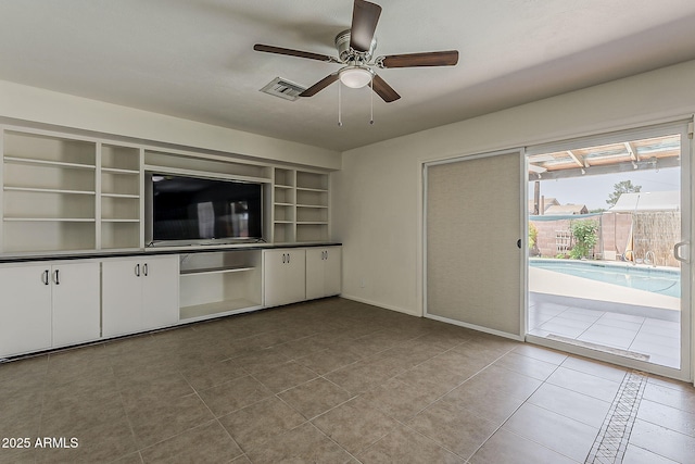 2432 W Echo Ln, Phoenix, AZ 85021 - unfurnished living room featuring tile patterned floors and a ceiling fan