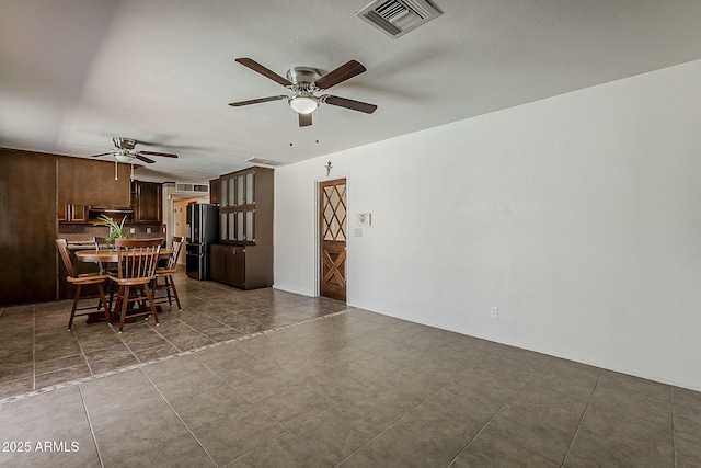 2432 W Echo Ln, Phoenix, AZ 85021 - dining space with ceiling fan and tile patterned floors