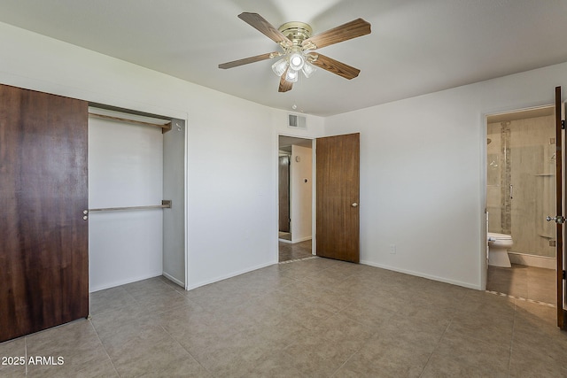 2432 W Echo Ln, Phoenix, AZ 85021 - unfurnished bedroom with a closet, connected bathroom, ceiling fan, and tile patterned floors
