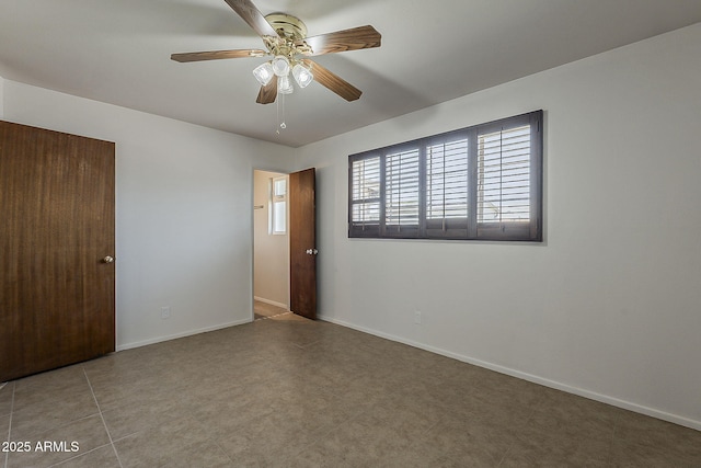 2432 W Echo Ln, Phoenix, AZ 85021 - empty room with ceiling fan and baseboards