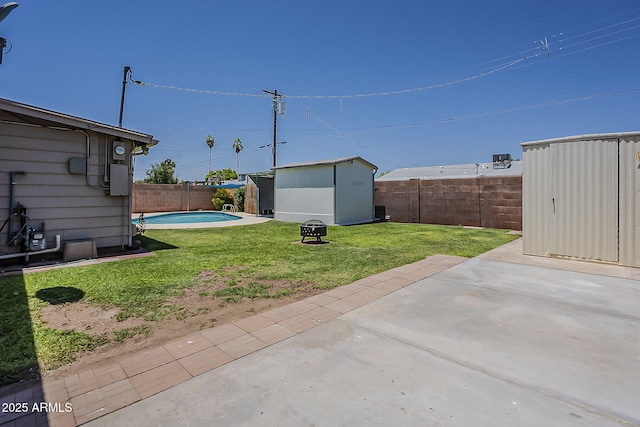 2432 W Echo Ln, Phoenix, AZ 85021 - fenced backyard with a storage unit and a patio area