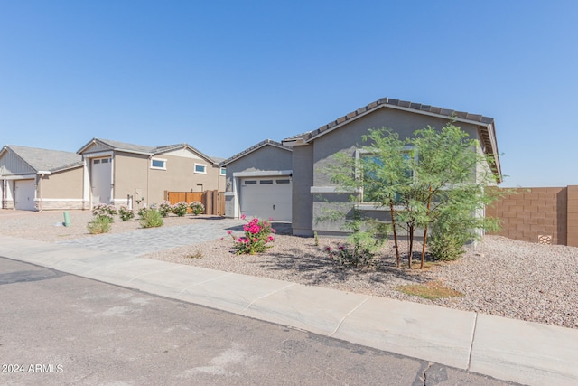 view of front of property with a garage