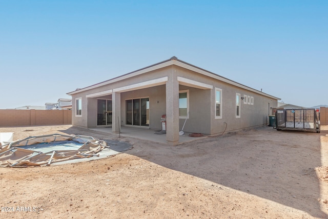 rear view of property with a patio area