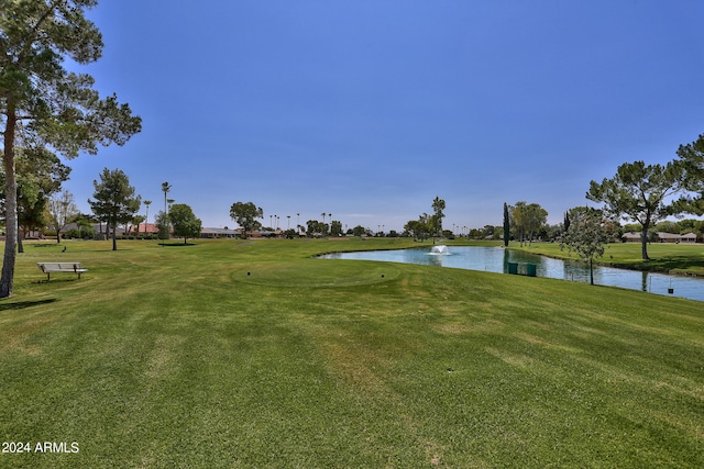 view of nearby features featuring a water view and a yard