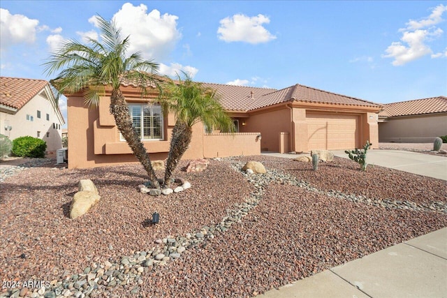 view of front of property featuring a garage