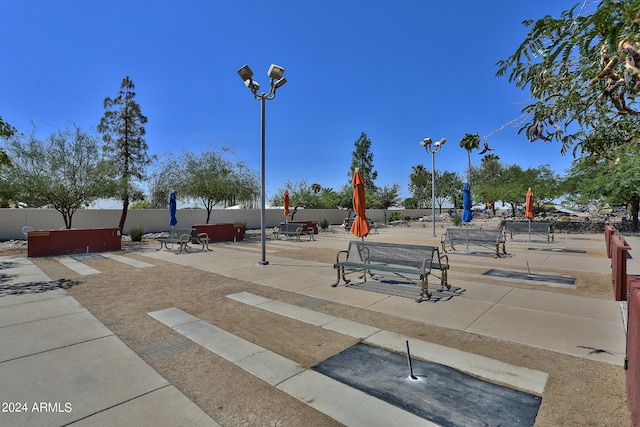 view of home's community with a patio area