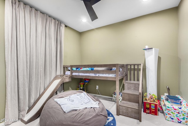 carpeted bedroom featuring ceiling fan