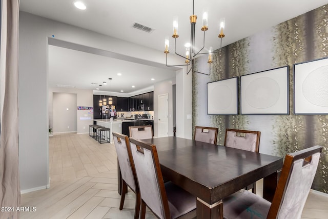 dining room featuring an inviting chandelier