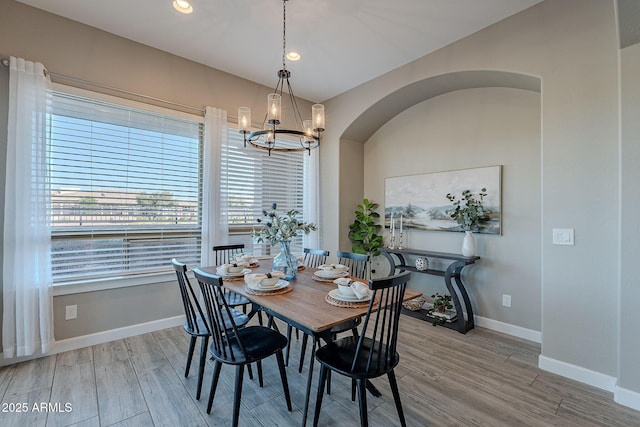 36169 N Serrano Ave, Queen Creek, AZ 85140 - dining area with recessed lighting, baseboards, an inviting chandelier, and wood finished floors