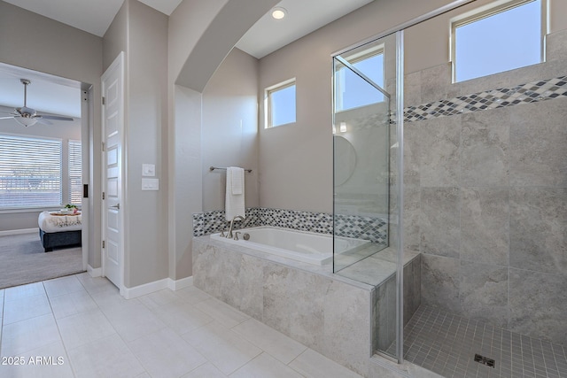 36169 N Serrano Ave, Queen Creek, AZ 85140 - bathroom featuring a bath, a healthy amount of sunlight, ensuite bath, and tile patterned flooring