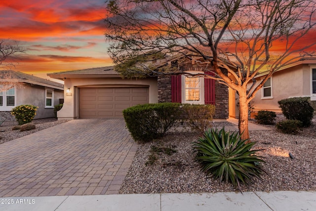 view of front of home with a garage