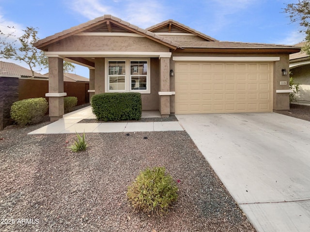 view of front of property featuring a garage