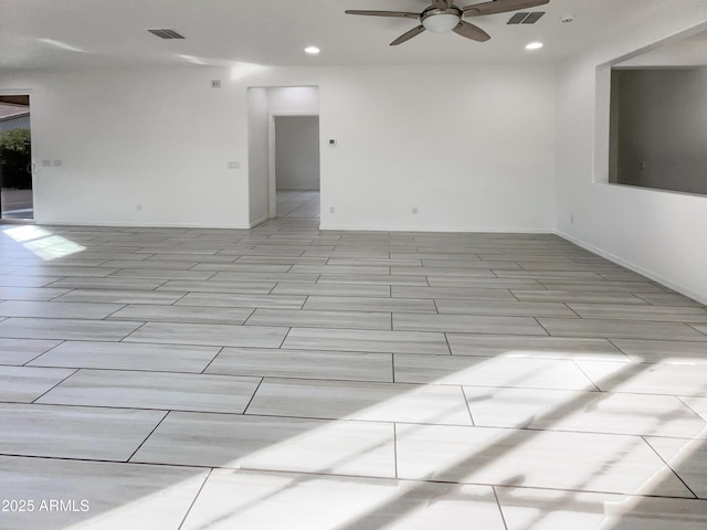 empty room featuring ceiling fan