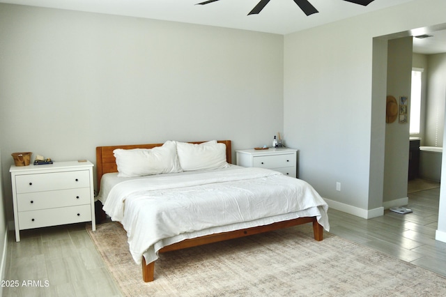 bedroom with visible vents, ceiling fan, light wood-type flooring, and baseboards