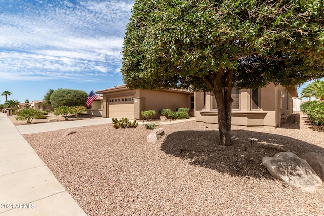 view of front of property featuring a garage