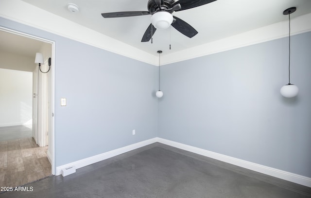 unfurnished room with ceiling fan