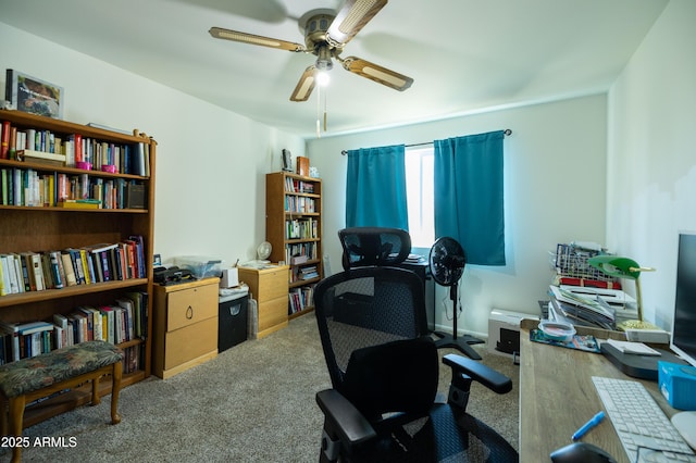 office featuring carpet flooring and ceiling fan