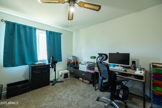 home office with a ceiling fan and carpet floors