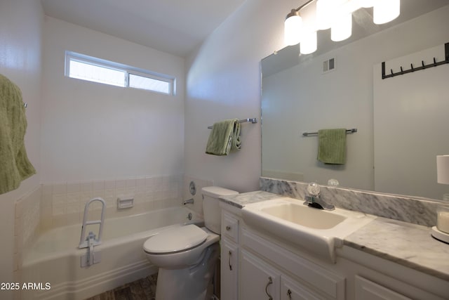 full bath with vanity, a garden tub, toilet, and visible vents