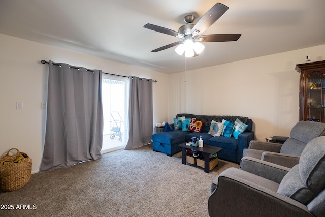 living area with carpet flooring and a ceiling fan