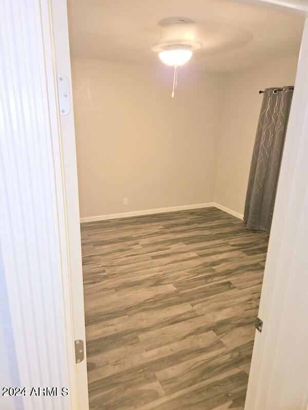 empty room featuring hardwood / wood-style flooring