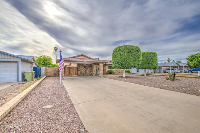 single story home featuring fence and driveway