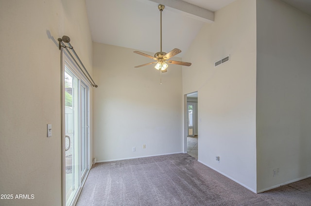 spare room with high vaulted ceiling, visible vents, carpet floors, and a wealth of natural light