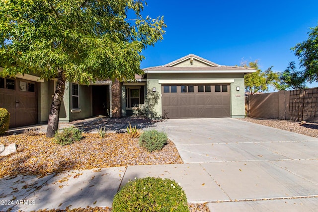 view of front of home with a garage