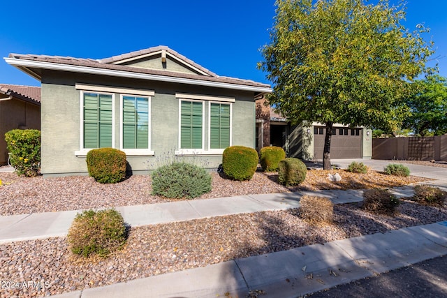 view of front of property featuring a garage