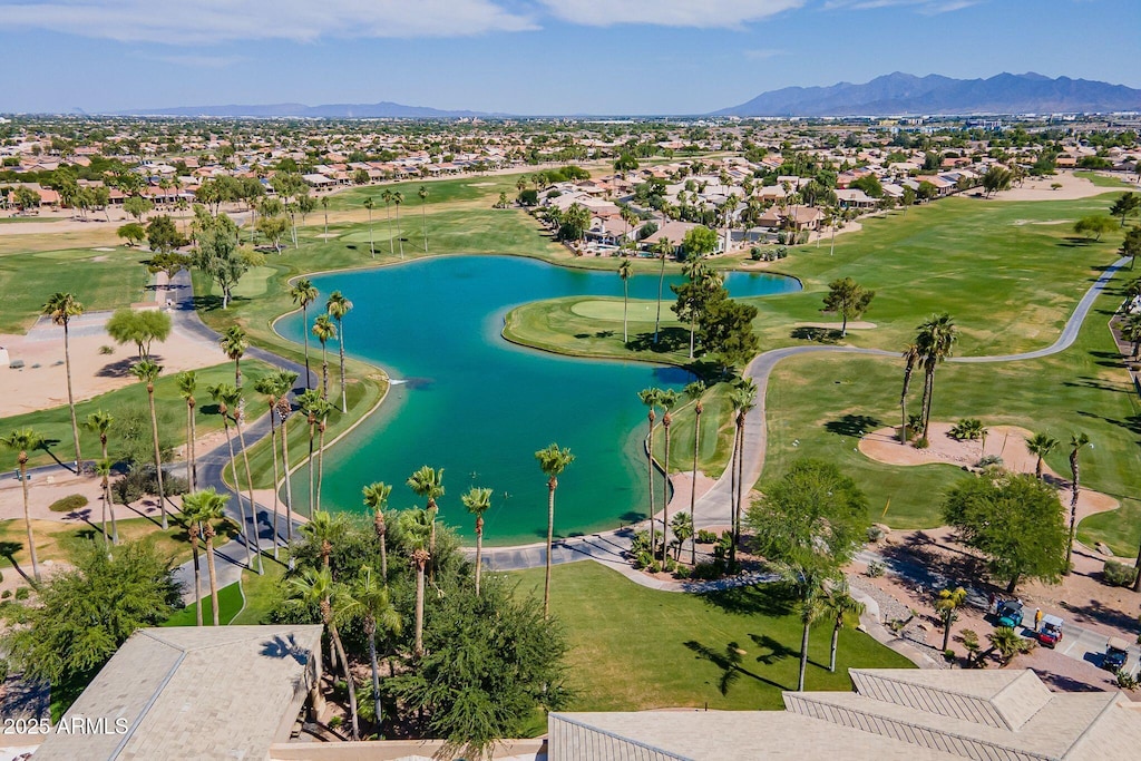 birds eye view of property featuring a water and mountain view