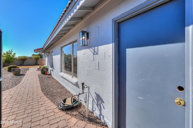 view of property exterior featuring a patio