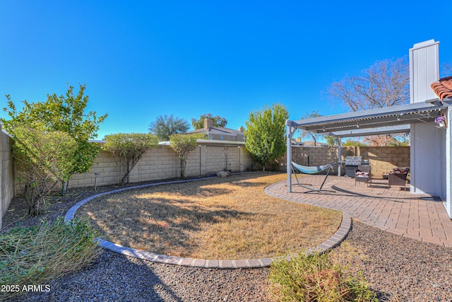 view of yard featuring a pergola and a patio