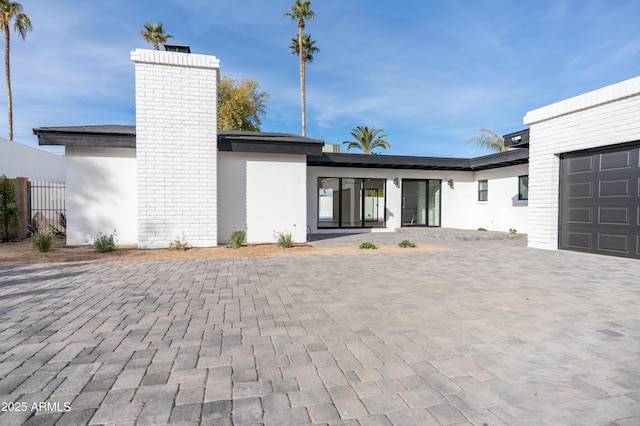 exterior space with a garage