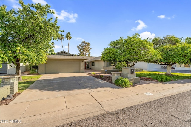 315 E Marlette Ave, Phoenix, AZ 85012 - view of front facade featuring a garage and driveway
