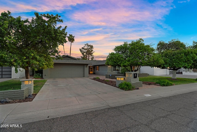 315 E Marlette Ave, Phoenix, AZ 85012 - ranch-style home featuring an attached garage and concrete driveway
