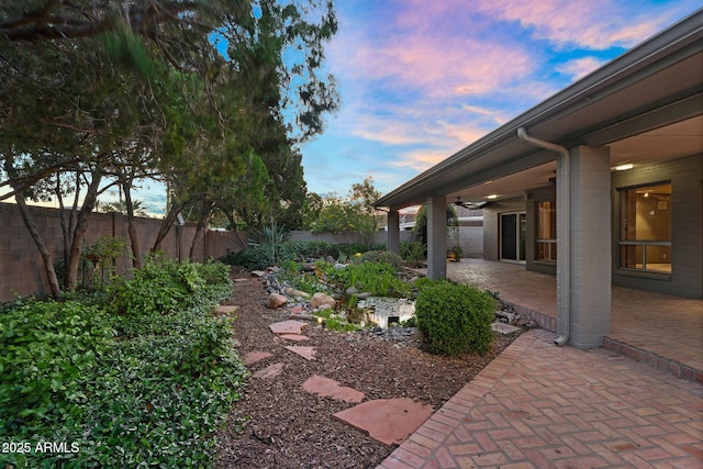 315 E Marlette Ave, Phoenix, AZ 85012 - view of yard with a fenced backyard, a ceiling fan, and a patio