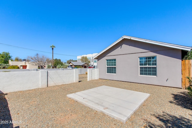 view of yard featuring a patio area and a fenced backyard