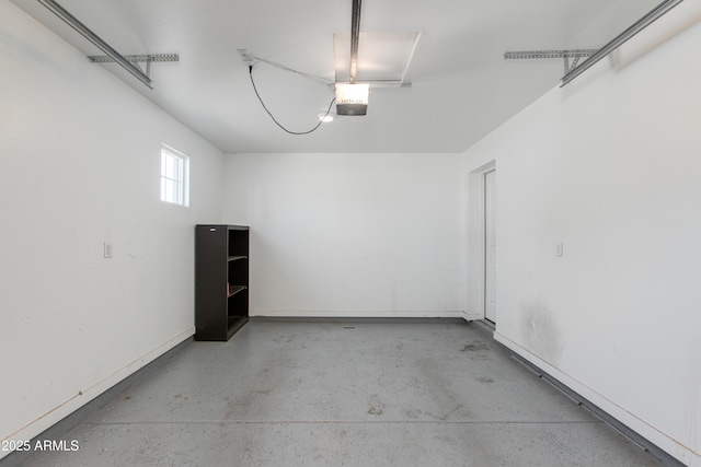 garage featuring baseboards