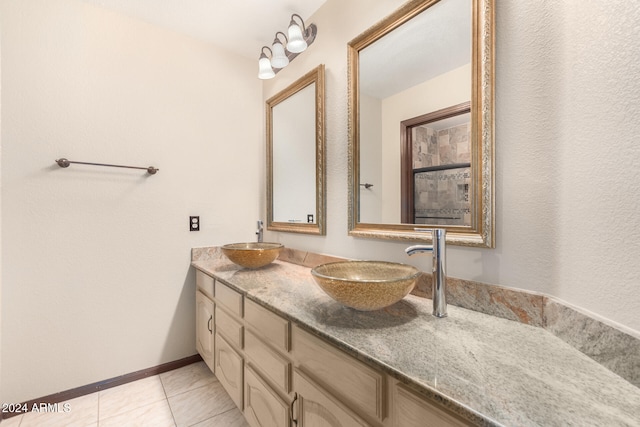 bathroom featuring vanity and tile patterned floors