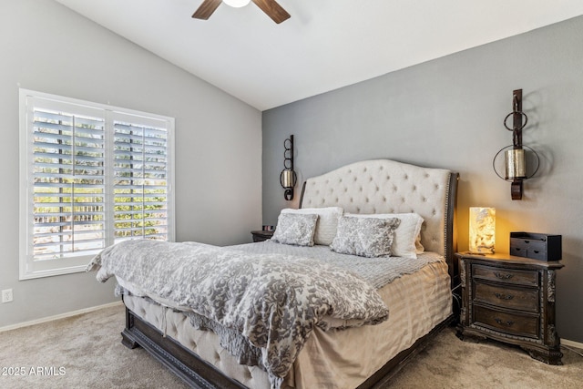 bedroom featuring baseboards, a ceiling fan, carpet flooring, and vaulted ceiling