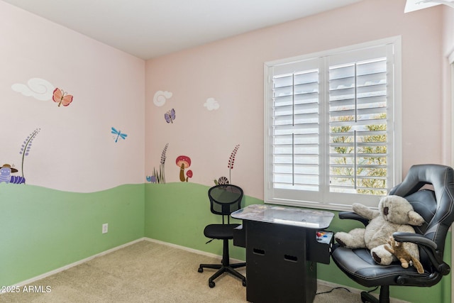 office with baseboards and carpet floors