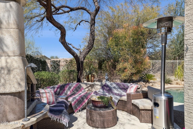 view of patio featuring an outdoor hangout area and fence private yard