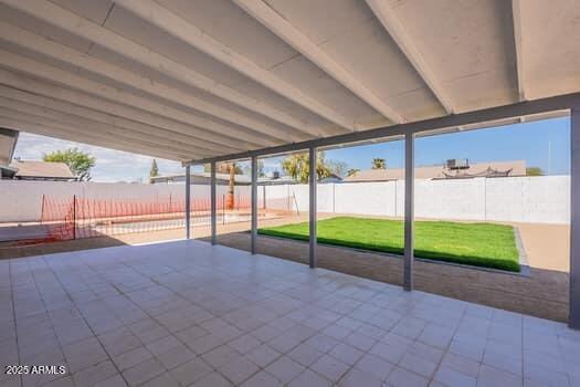 unfurnished sunroom with plenty of natural light